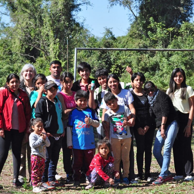St. Steven's church member posing with group of people in Argentina