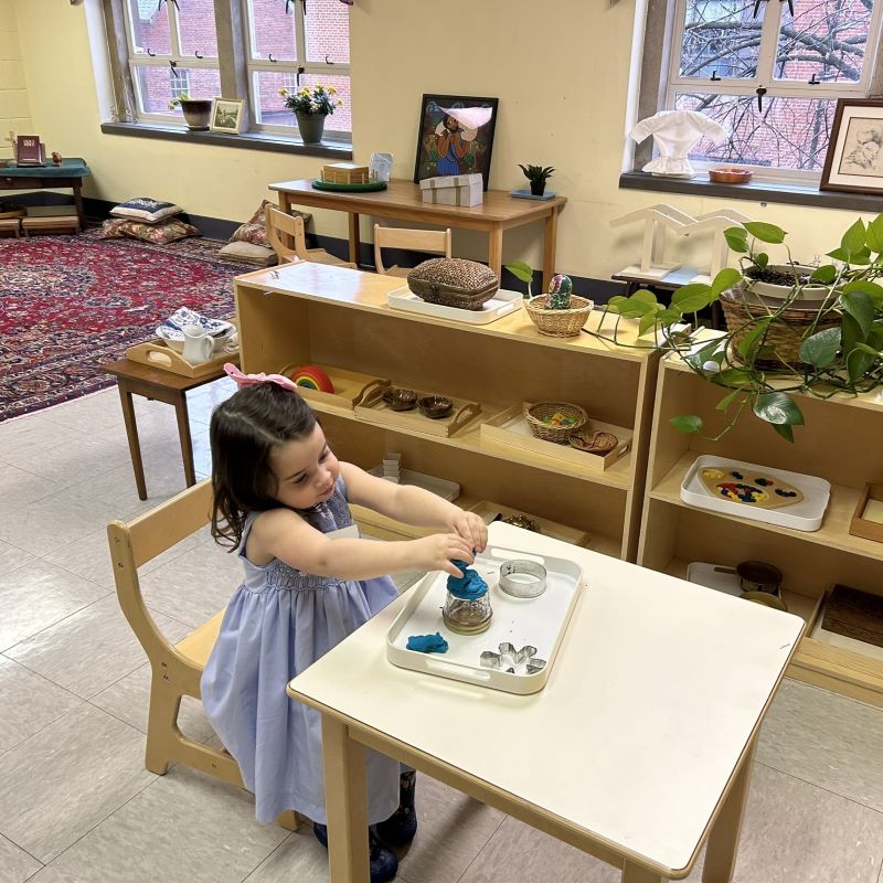 Child playing with playdoh at St. Stephen's Church in Richmond, Virginia