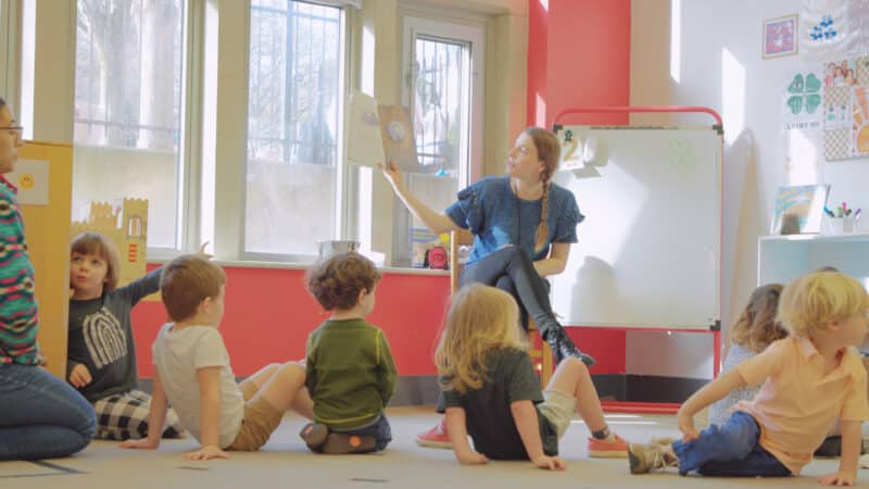 Teacher reading to young children at Dogwood Preschool