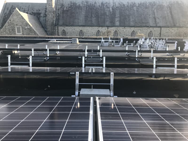 Solar panels on top of parish house at St. Stephen's Church in Richmond, Virginia